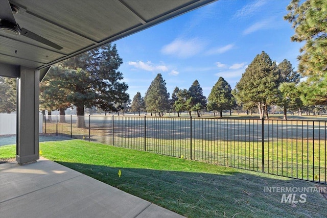 exterior space featuring ceiling fan