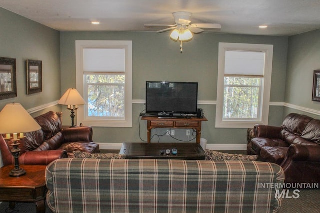 living room featuring ceiling fan