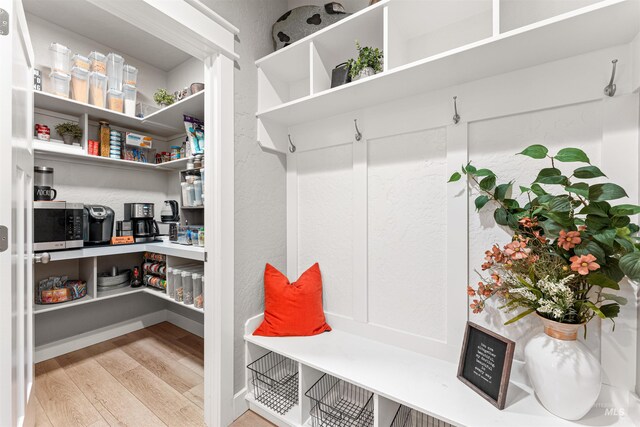 1670 Mary Hill Ave, Middleton, ID 83644 - mudroom featuring wood finished floors and a textured wall
