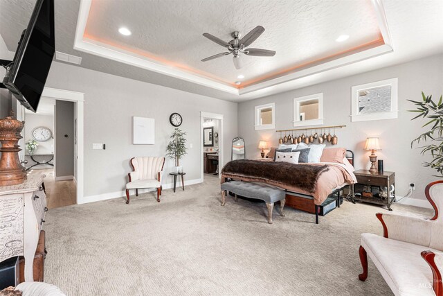 1670 Mary Hill Ave, Middleton, ID 83644 - bedroom featuring a tray ceiling, carpet floors, baseboards, recessed lighting, and ensuite bath