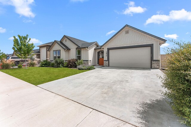 1670 Mary Hill Ave, Middleton, ID 83644 - ranch-style house with an attached garage, board and batten siding, driveway, and stone siding