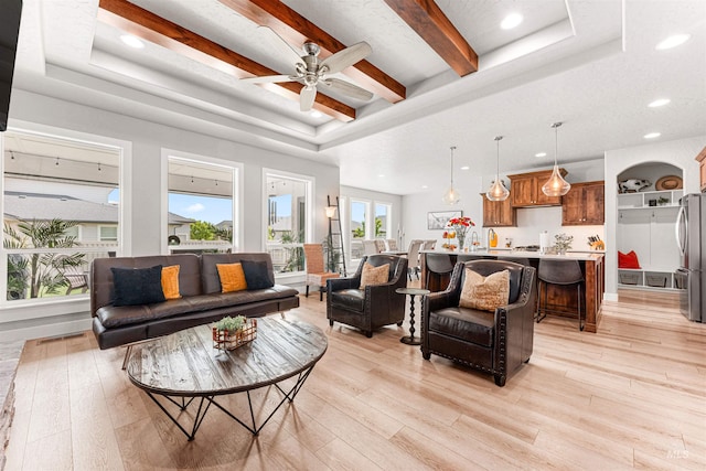 1670 Mary Hill Ave, Middleton, ID 83644 - living room with a raised ceiling, light wood finished floors, recessed lighting, ceiling fan, and beamed ceiling