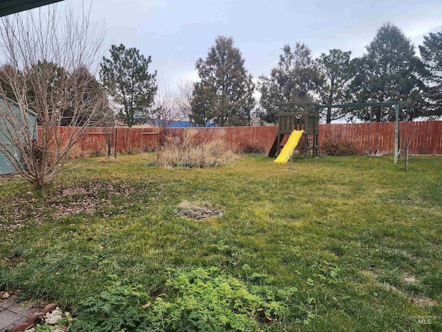 view of yard with a playground