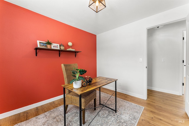 office space with light hardwood / wood-style floors