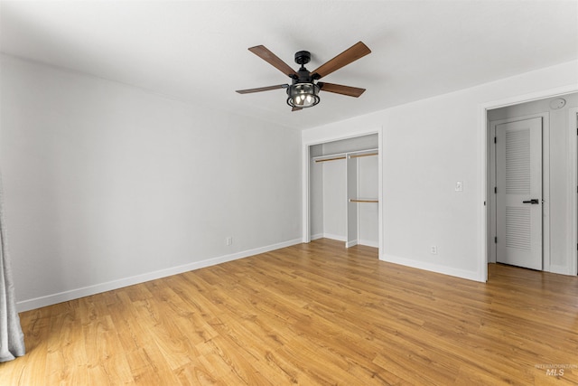 unfurnished bedroom with ceiling fan, light hardwood / wood-style floors, and a closet