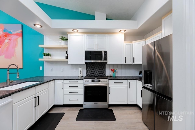 8079 W Beckton Ln, Garden City, ID 83714 - kitchen featuring appliances with stainless steel finishes, a sink, tasteful backsplash, open shelves, and white cabinets