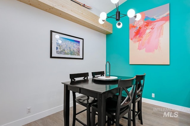 8079 W Beckton Ln, Garden City, ID 83714 - dining space with wood finished floors and baseboards