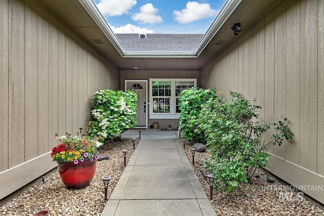 8079 W Beckton Ln, Garden City, ID 83714 - doorway to property with a shingled roof