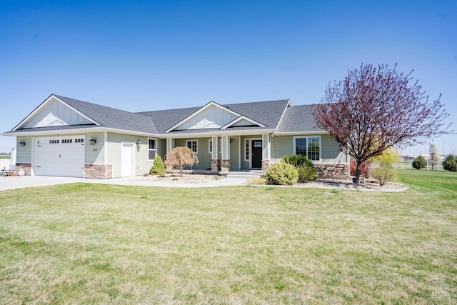 ranch-style house featuring a porch, stone siding, concrete driveway, an attached garage, and board and batten siding