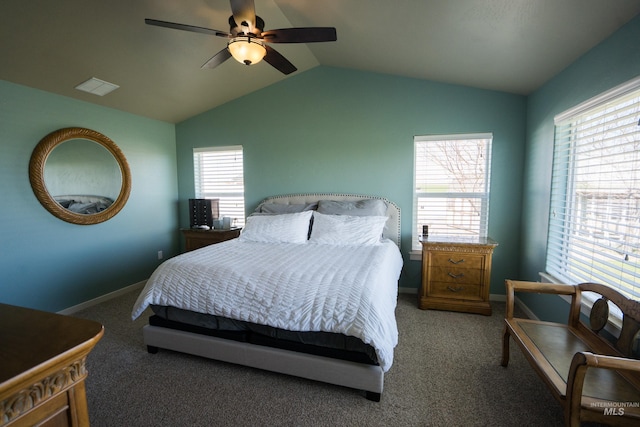 carpeted bedroom featuring ceiling fan, lofted ceiling, visible vents, and baseboards