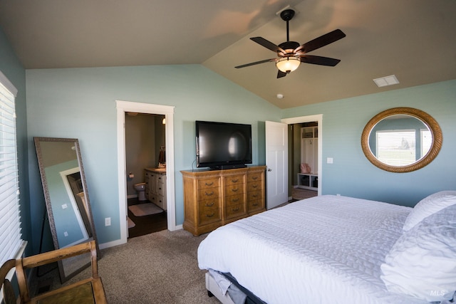 carpeted bedroom featuring vaulted ceiling, a ceiling fan, multiple windows, and baseboards