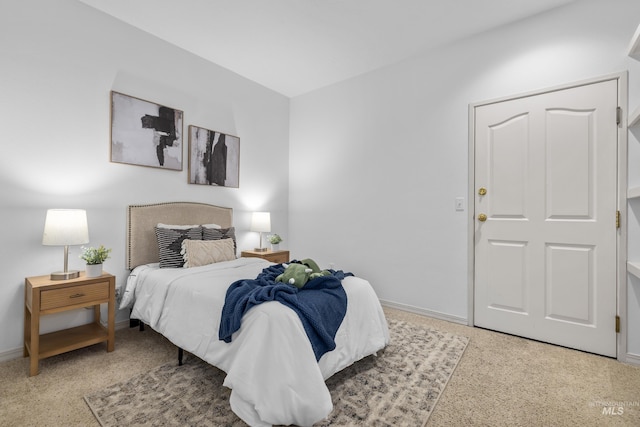 bedroom featuring baseboards