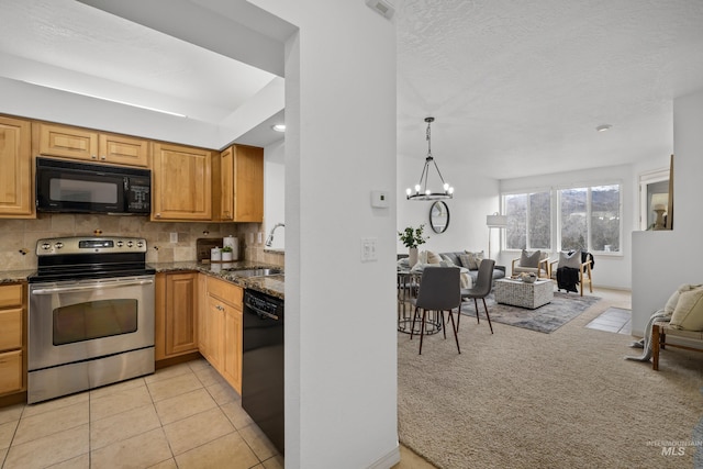 kitchen with light carpet, open floor plan, a sink, black appliances, and backsplash