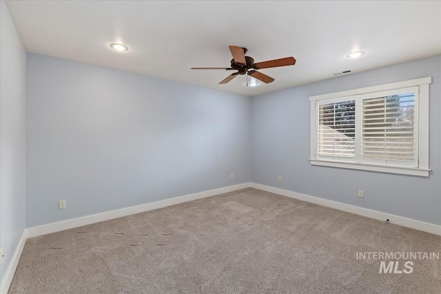 unfurnished room featuring visible vents, baseboards, carpet floors, recessed lighting, and a ceiling fan