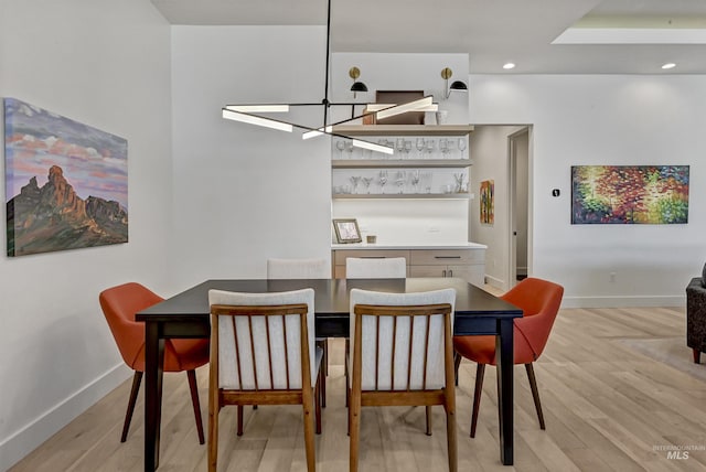 2313 S Aburge Ave, Meridian, ID 83642 - dining room featuring baseboards, light wood-style flooring, recessed lighting, and a chandelier