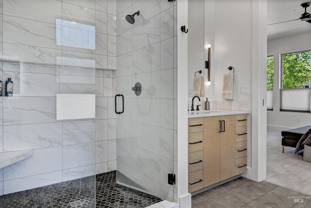 2313 S Aburge Ave, Meridian, ID 83642 - full bathroom featuring a shower stall, vanity, and tile patterned flooring