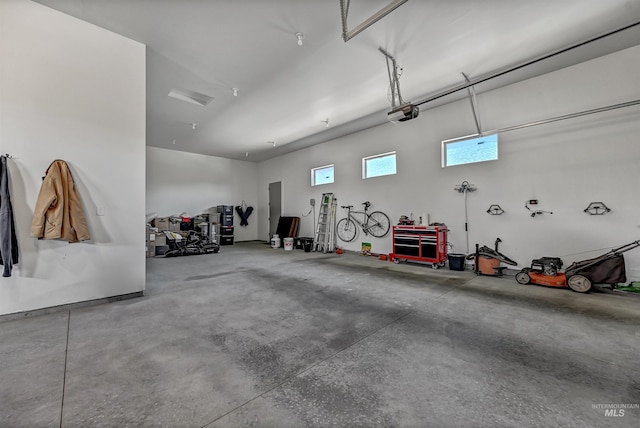 2313 S Aburge Ave, Meridian, ID 83642 - garage featuring a garage door opener