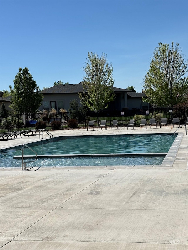 2313 S Aburge Ave, Meridian, ID 83642 - community pool with fence and a patio