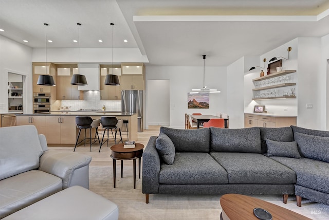 2313 S Aburge Ave, Meridian, ID 83642 - living room featuring wet bar, light wood-style flooring, and recessed lighting
