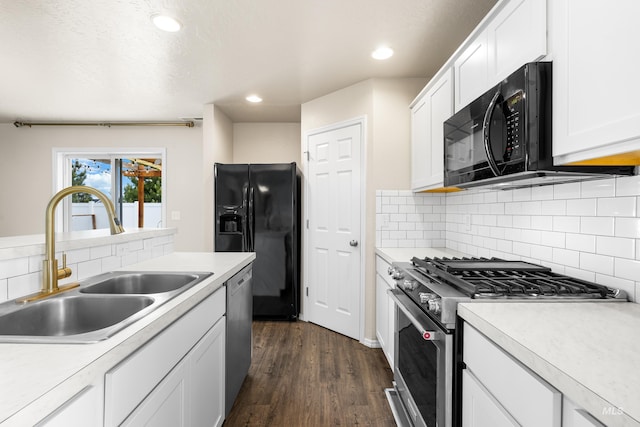 942 S Stibnite Pl, Kuna, ID 83634 - kitchen with black appliances, a sink, light countertops, and recessed lighting
