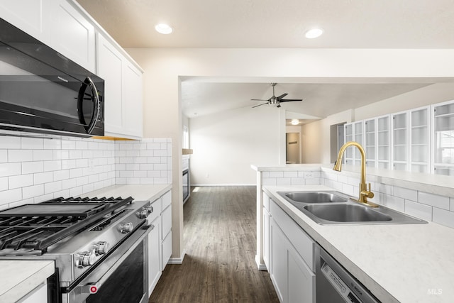 942 S Stibnite Pl, Kuna, ID 83634 - kitchen featuring black microwave, stainless steel gas range, a sink, a ceiling fan, and dark wood finished floors