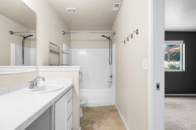 942 S Stibnite Pl, Kuna, ID 83634 - bathroom featuring vanity, toilet, a textured ceiling, shower / bathtub combination, and baseboards