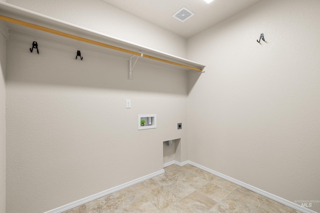 942 S Stibnite Pl, Kuna, ID 83634 - washroom with hookup for a washing machine, baseboards, and hookup for an electric dryer