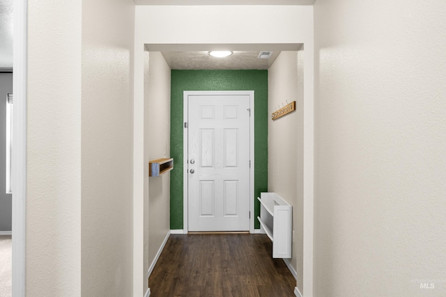 942 S Stibnite Pl, Kuna, ID 83634 - corridor with dark wood finished floors and baseboards