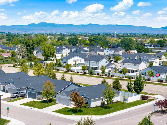 942 S Stibnite Pl, Kuna, ID 83634 - aerial perspective of suburban area featuring a mountain backdrop