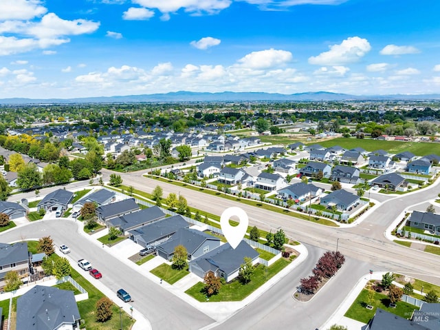 942 S Stibnite Pl, Kuna, ID 83634 - aerial view of residential area featuring a mountain backdrop