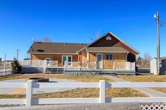 view of front of house with a deck