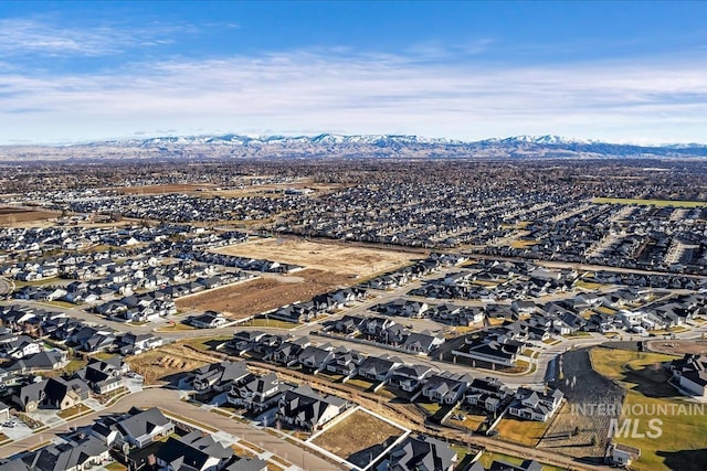 drone / aerial view featuring a mountain view