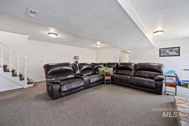 carpeted living area featuring stairway, baseboards, and visible vents