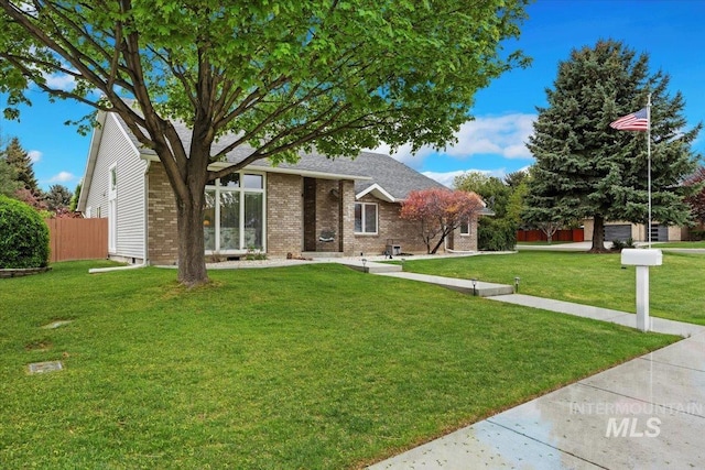 view of front of house with brick siding