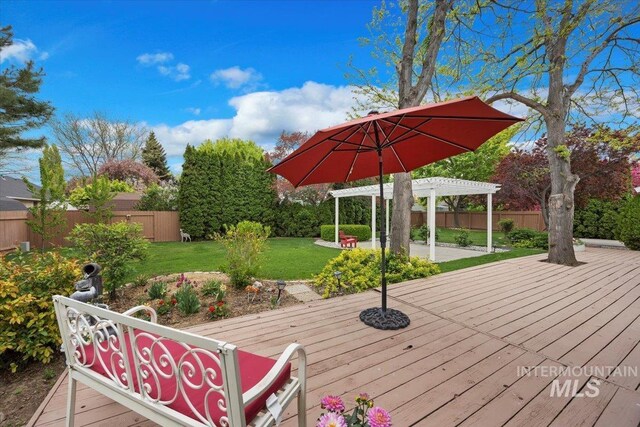 wooden terrace featuring a pergola