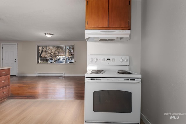 kitchen featuring a baseboard heating unit, white range with electric cooktop, under cabinet range hood, brown cabinets, and light wood-style floors