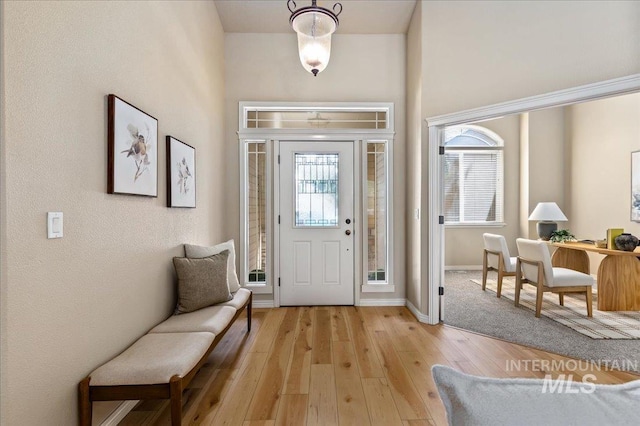 entrance foyer with light wood-type flooring