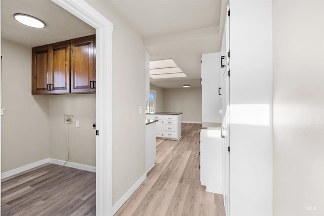 hall featuring light wood-type flooring