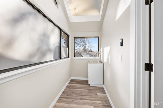 washroom featuring light hardwood / wood-style floors