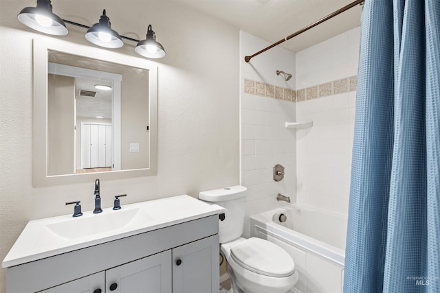 full bathroom featuring vanity, toilet, and shower / bathtub combination with curtain