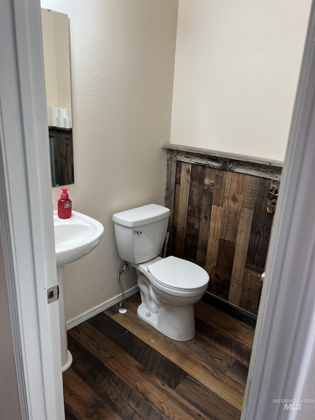 2059 Spring Creek Dr, Fruitland, ID 83619 - bathroom with toilet and wood finished floors