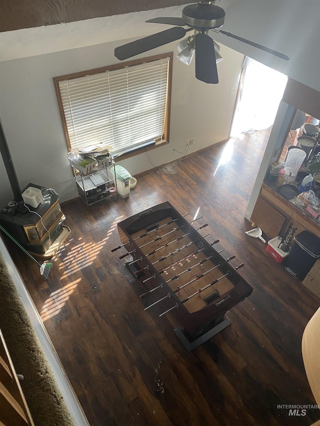 interior space featuring ceiling fan and wood finished floors