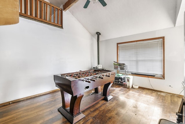 game room with lofted ceiling with beams, baseboards, wood-type flooring, and ceiling fan