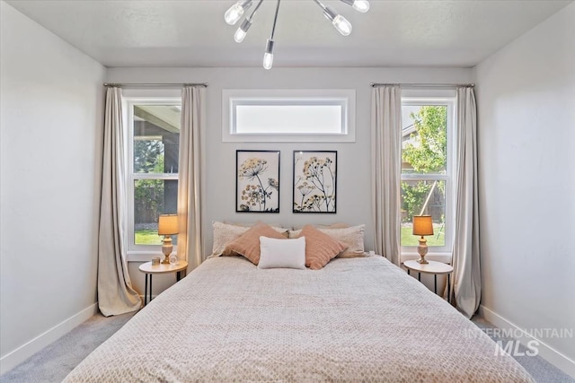 1765 E Bergeson St, Boise, ID 83706 - carpeted bedroom featuring baseboards