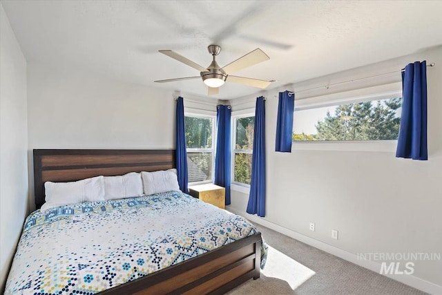 1765 E Bergeson St, Boise, ID 83706 - bedroom with carpet flooring, baseboards, and a ceiling fan