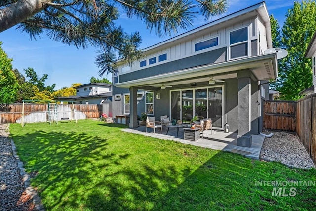 1765 E Bergeson St, Boise, ID 83706 - rear view of property featuring a ceiling fan, stucco siding, outdoor lounge area, a patio area, and board and batten siding