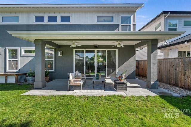 1765 E Bergeson St, Boise, ID 83706 - back of property featuring stucco siding, ceiling fan, and a patio