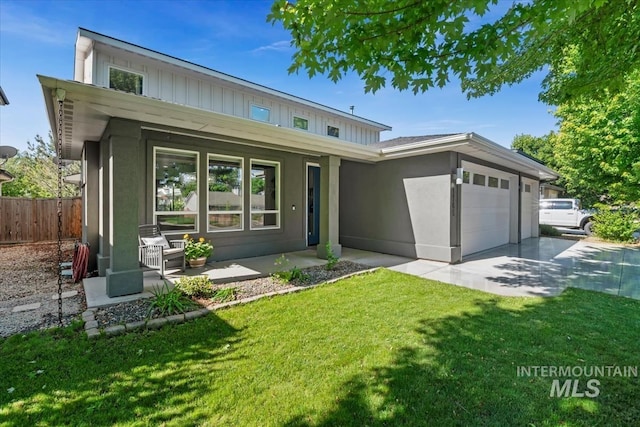 1765 E Bergeson St, Boise, ID 83706 - view of front of property with an attached garage, concrete driveway, and covered porch