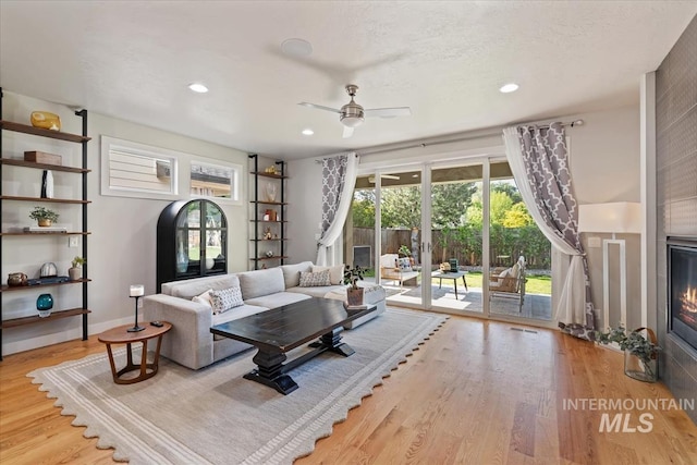 1765 E Bergeson St, Boise, ID 83706 - living area featuring wood finished floors, a ceiling fan, and recessed lighting
