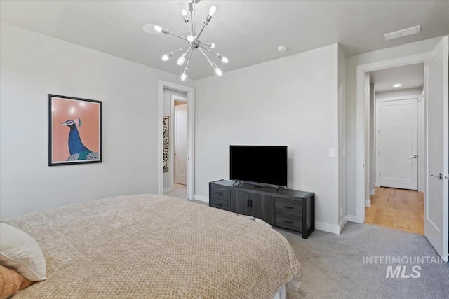 1765 E Bergeson St, Boise, ID 83706 - bedroom featuring a chandelier, light colored carpet, and baseboards